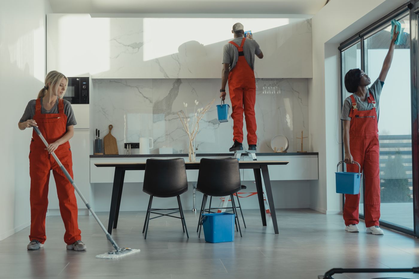 Commercial cleaning crew working in a modern office